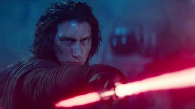kylo ren looking angsty holding his saber outwards