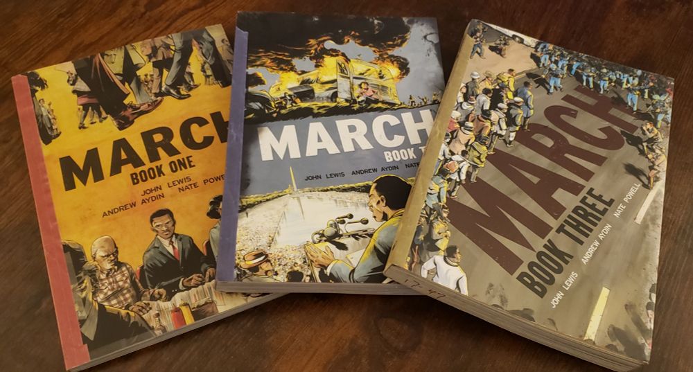 A photo of the March trilogy of graphic novels by John Lewis, Andrew Aydin, and Nate Powell
