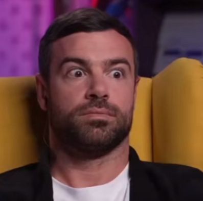 Ben Starr with his eyes wide open looking horrors and shocked, slightly annoyed even.