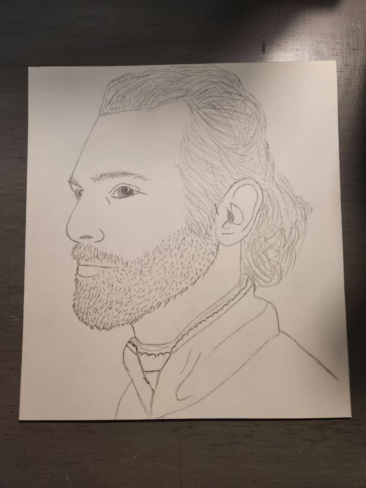 Profile sketch of a blonde haired young man with a full beard