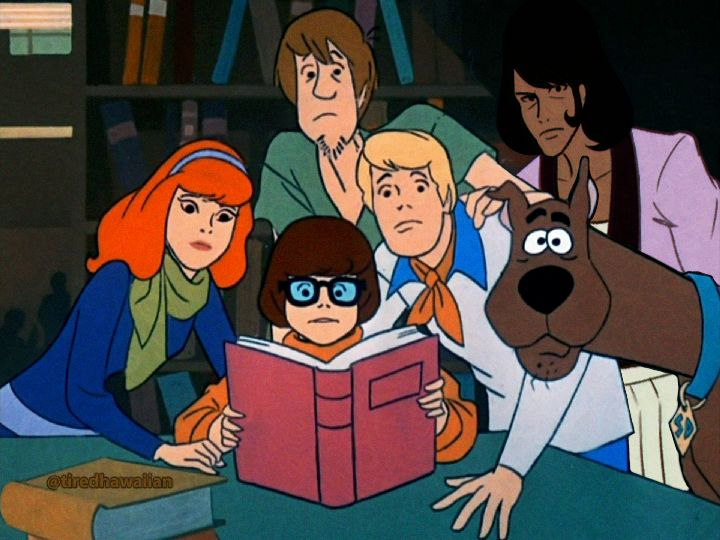 A screenshot edit with a digital drawing added into it of Goemon Ishikawa XIII from the anime "Lupin the Third", from a screenshot I took of the opening to "Scooby Doo, Where Are You"?

The Mystery gang are sporting their looking at the camera scene from the original opening in the library, with Velma Dinkley having a red book open in front of her, sitting at a table.

Goemon is edited in behind Scooby, Fred and Shaggy on the right hand side, wearing his part 1 outfit from Lupin.