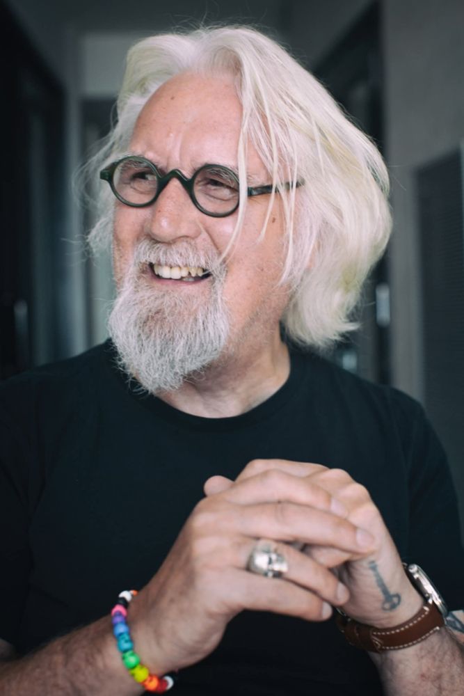 A photo of a smiling Billy Connolly. 