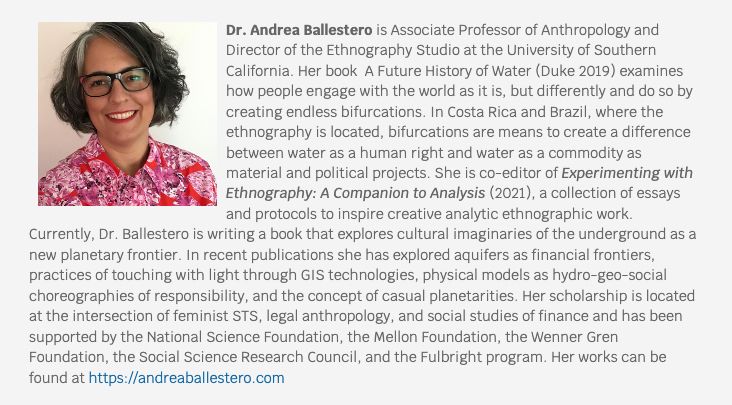 Photographic portrait of Dr. Andrea Ballestero, a senior LatinX / Latina woman facing the camera with short brown and grey bobbed hair and thick black rimmed glasses. She smiles direct at camera with red lipstick and a red and pink patterned shirt, cropped at the shoulders.