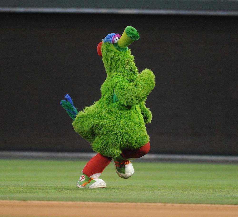 Naked Phanatic running through the outfield
