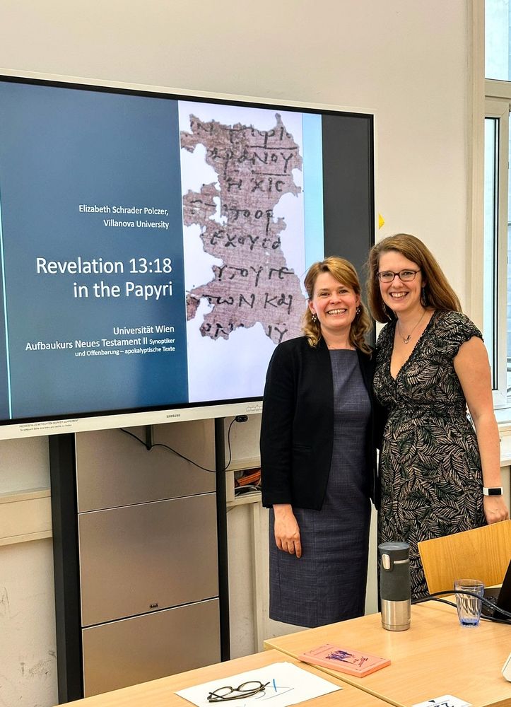 Picture of Elizabeth Schrader-Polczer and me. Next to us is the starting slide of her PowerPoint on the screen. The title of her presentation was "Revelation 13:18 in the Papyri" 