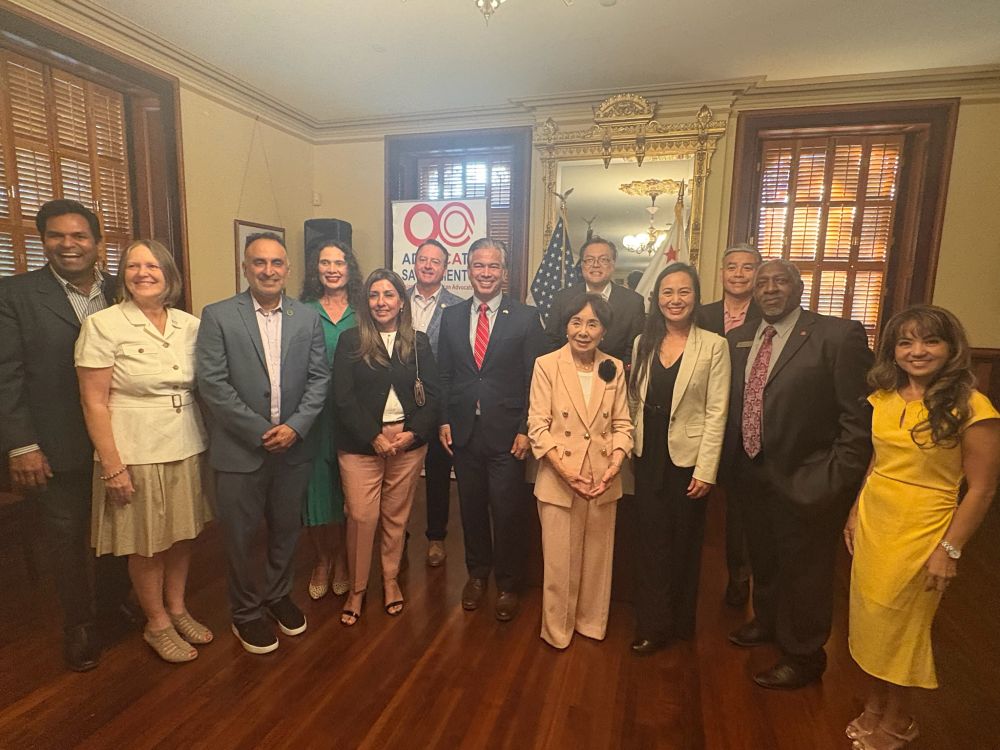Doris stands with fellow elected AAPI elected officials 