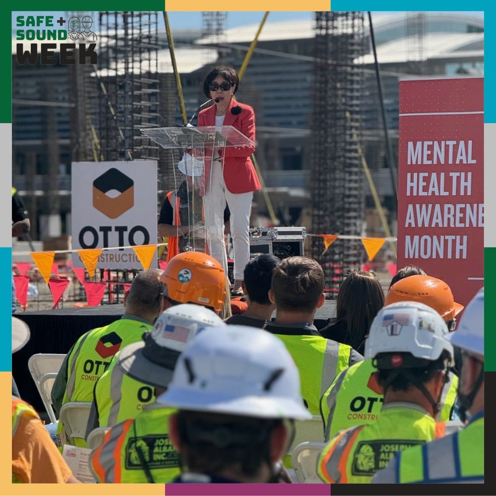 Doris speaks to construction workers during mental health awareness month.