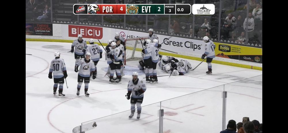 The Winterhawks celebrate after winning Game 7 of their second-round series against the Everett Silvertips