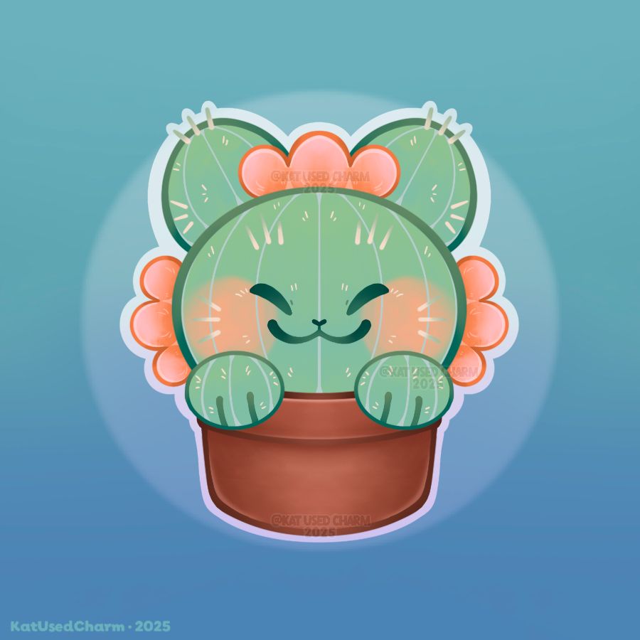 Small Cat-Cus (cactus cat) sitting in a planter pot. 