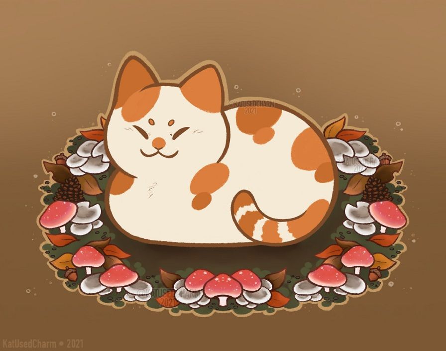 chubby cat in loaf mode resting in the middle of an autumn fairy circle.