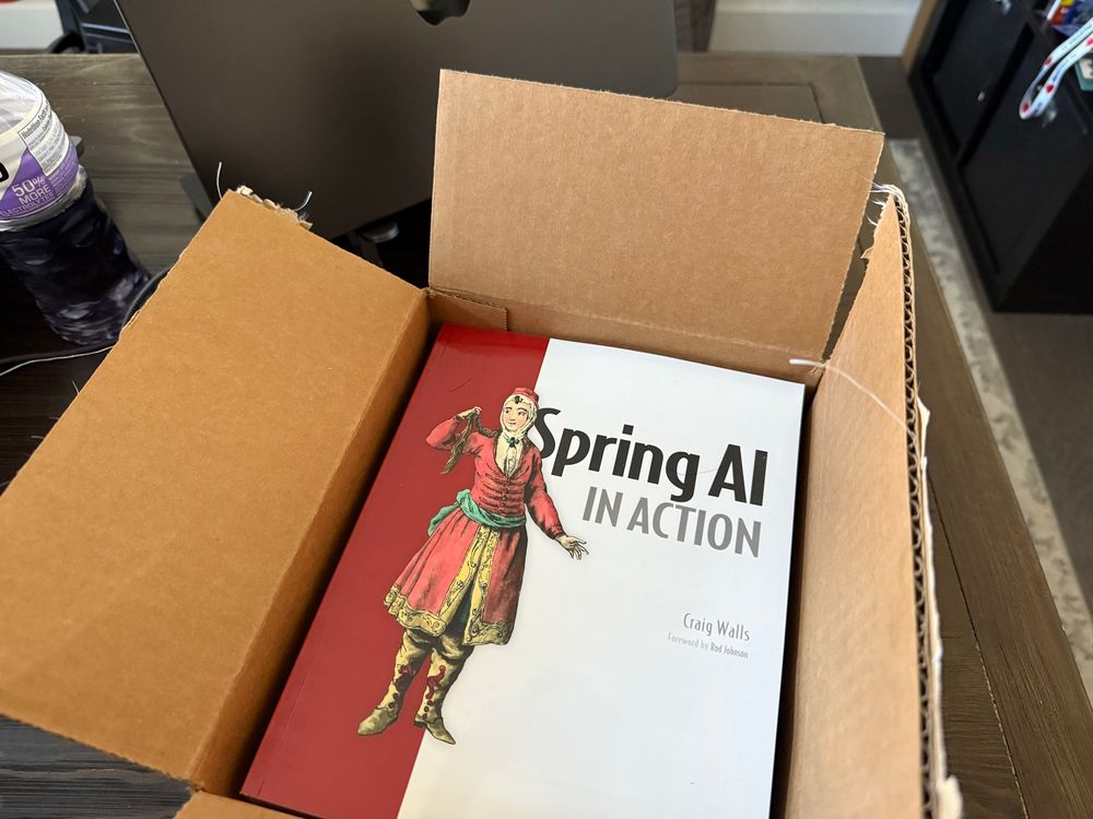 A box of newly printed copies of Spring AI in Action.