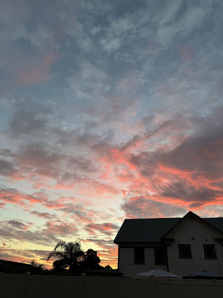 clouds that look pink because of light from sunset