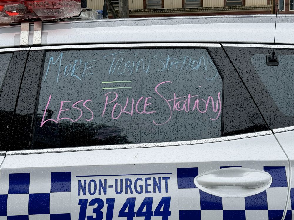 Phrase painted on the side of a police car in Melbourne: 
More train stations = less police stations