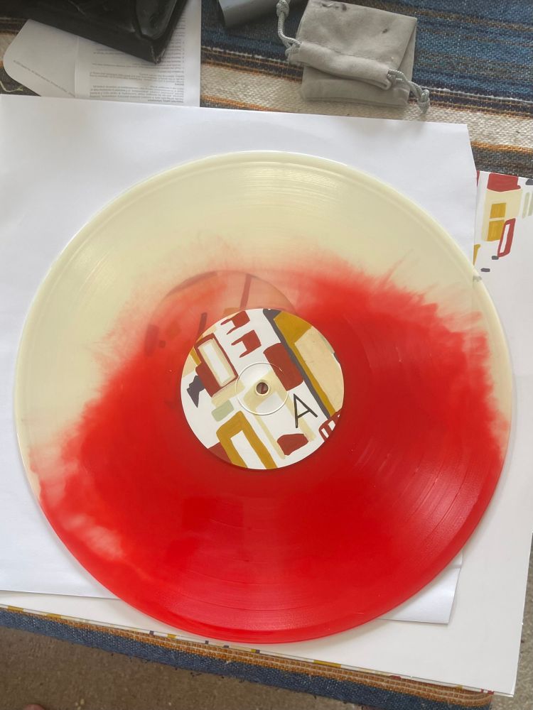 Yumy Zouma - (What's the Story) Morning Glory? record. It features a red/cream blend colour. 