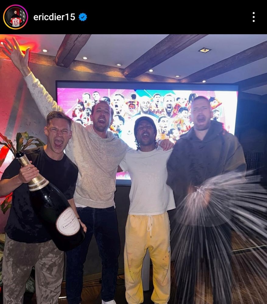 Eric Dier celebrates with some of his Bayern Munich teammates