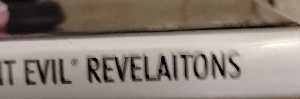 Resident evil revelations spine where the word is misspelled as Revelaitons 