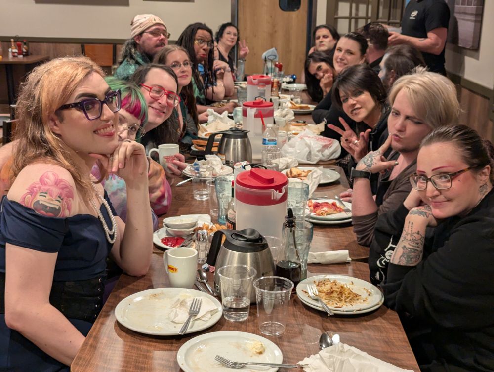 Left side : Nova Auron, Liv A. Lidelle, Darius Pucker, 3RIN, U3L, Jagun Alchemist, and Ashton Quinn.

Right side: Catalina Reaper, Joaquin Deadman, Tokio Night, Derrek Sammons (turned away), Birdie Page, Eris Noir, and Scarlett Snowblood 

(Sneakily hiding their faces; The Lady Alchemist, Prince Eric & our server 😂)