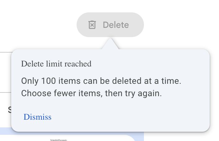 A tooltip in Google One saying "Delete limit reached. Only 100 items can be deleted at a time. Choose fewer items, then try again." Has a "Dismiss" button.