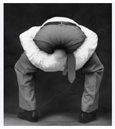 A guy with his head up his arse