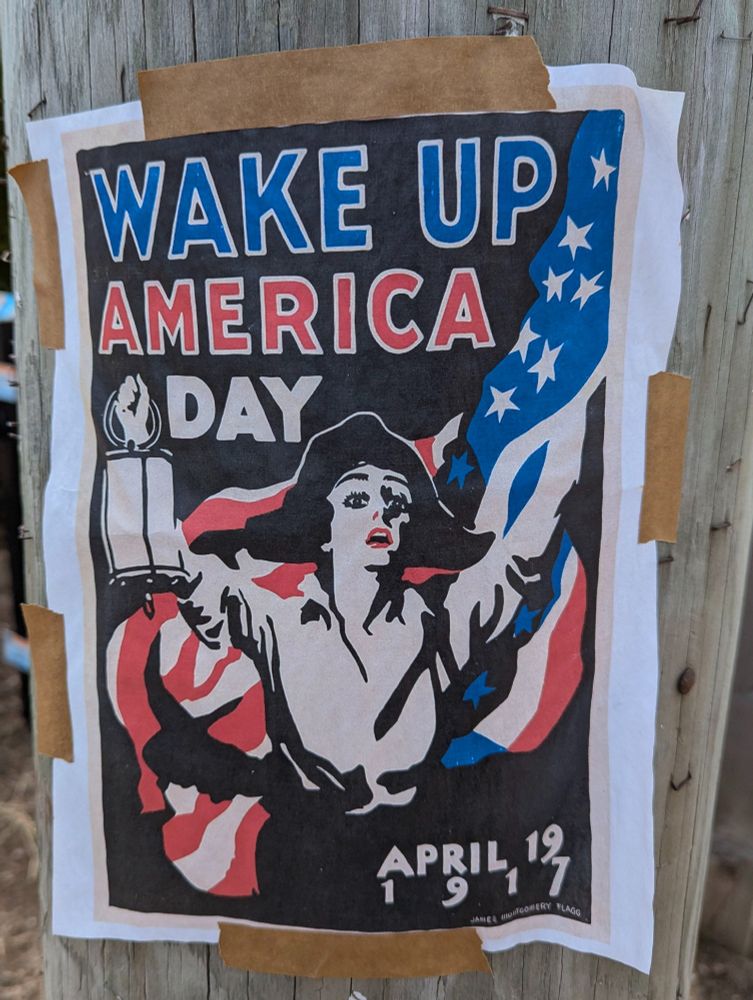 Poster taped to telephone pole in Portsmouth, NH commemorating "Wake Up America Day" (April 19, 1917) by James Montgomery Flagg. 