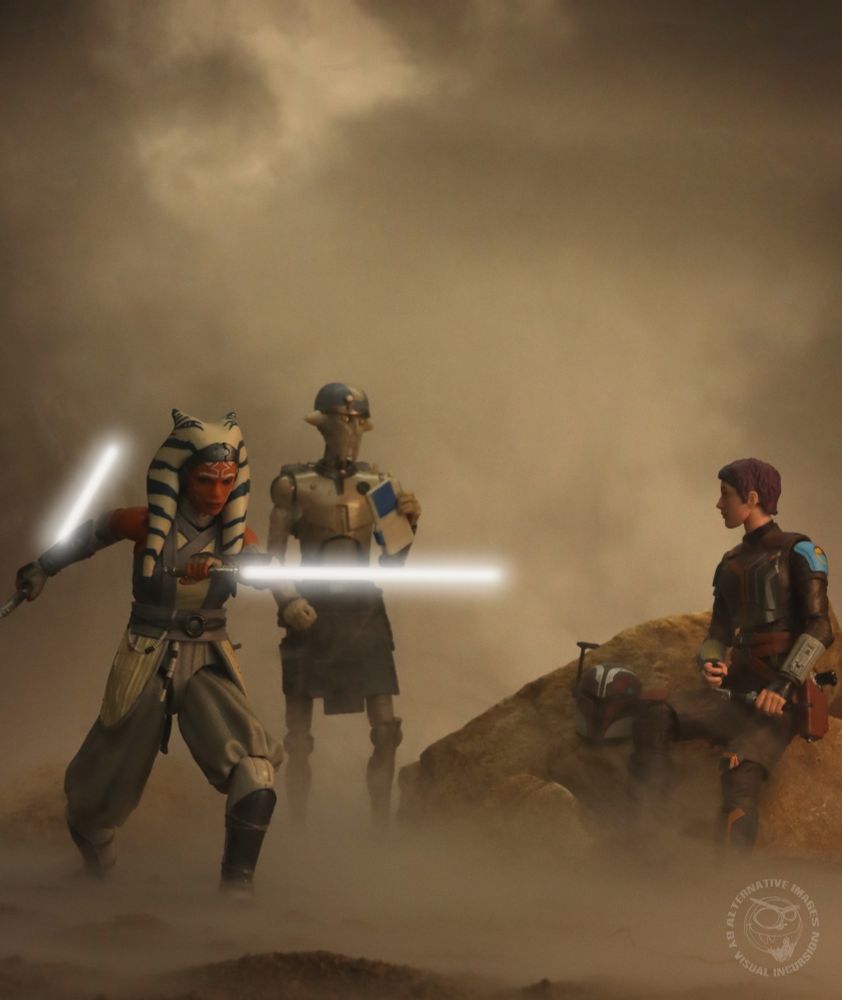 Ahsoka Tano is practising with her light sabers while Sabine sits on some rocks watching. Huyang looks on disapprovingly. It is cloudy and moody, there is a groind level mist. 