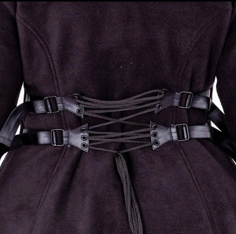 The back view of the coat. With straps. 