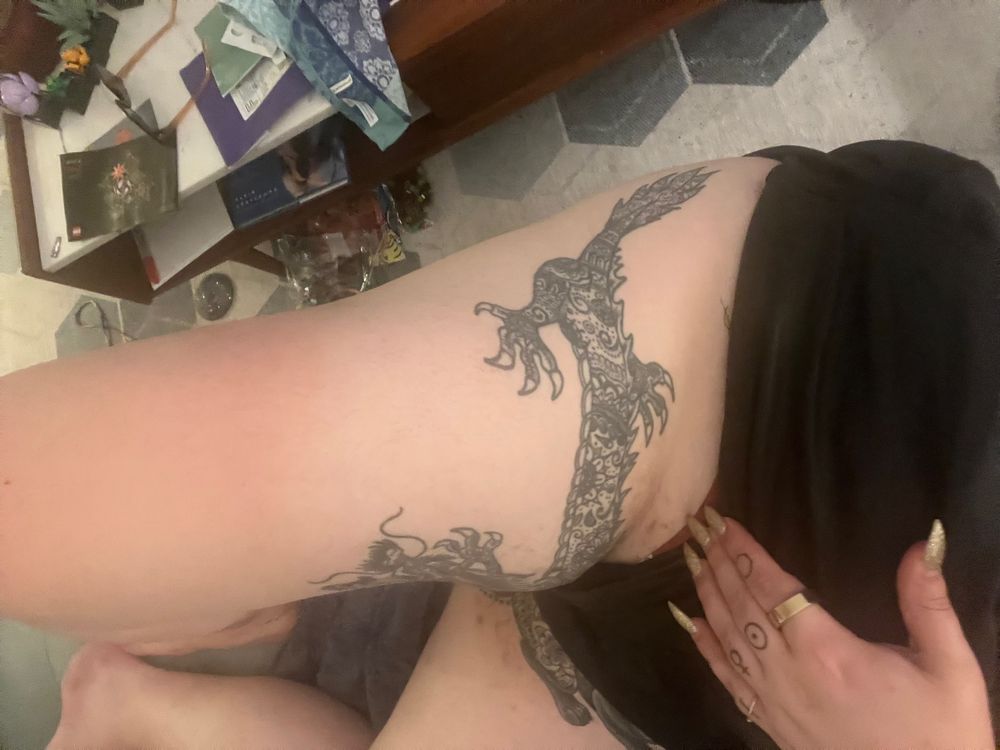 My legs have a dragon tattoo and a leopard tattoo