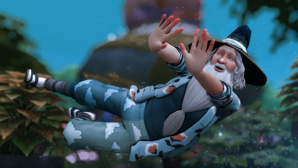 Glen, an old man with a long white beard wearing blue trousers with cloud designs and an open blue shirt over a dark blue vest, and also wearing a blue wizard hat, throws himself sideways while looking gleeful.