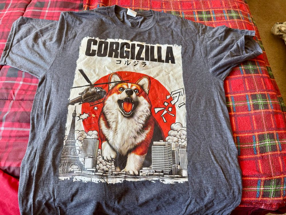 T-shirt depicting giant corgi destroying a city, reading “Corgizilla”