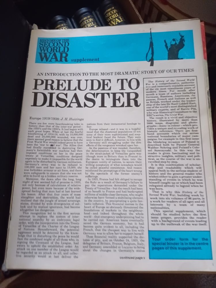 The first page of the first magazine of the serves. The headline is "Prelude to Disaster" and there are three columns of text. Also, there are two blue color blocks. One runs as a header and the other in the bottom right corner as a box. In the blue heading, there's a black graphic of a soldier raising his arms up as if he was hit in the back. His rifle floats vertically before him.