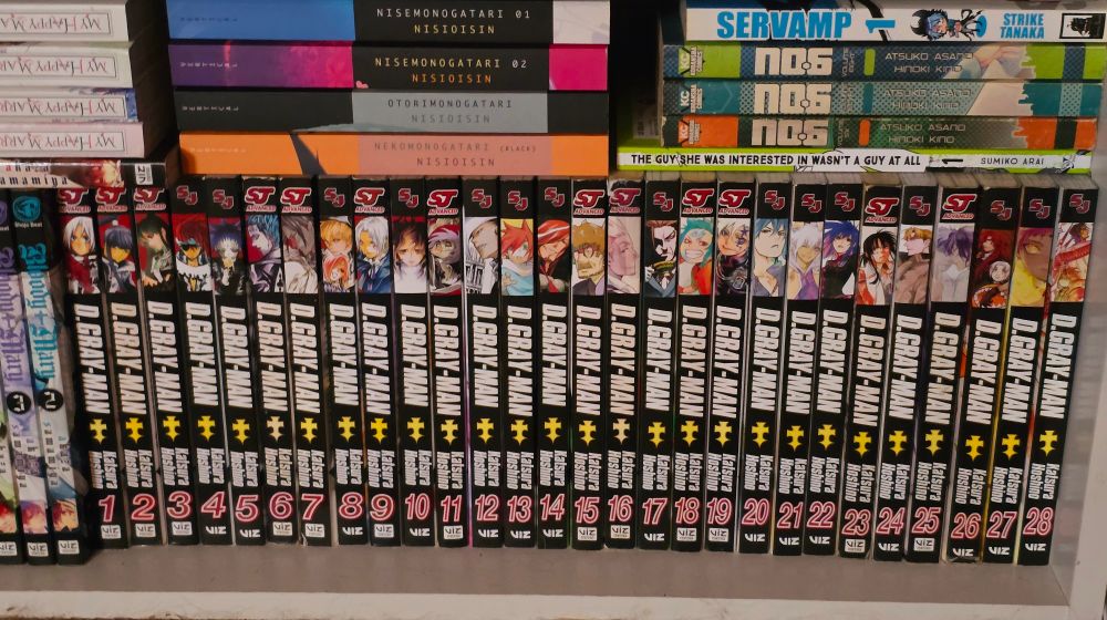My manga shelf showing my D.Gray-man volumes from 1-28 