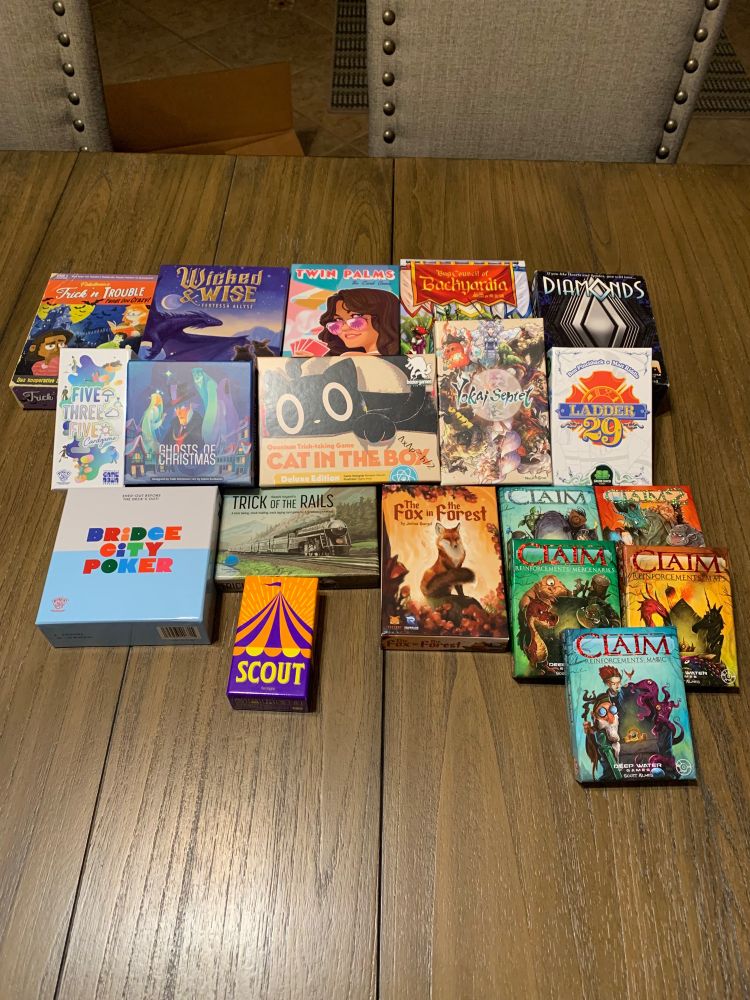 Trick taking games. Trick or treat, Wicked & Wise, Twin Palms, Bug council of Backyardia, Diamonds, 535, Ghosts of Christmas, Cat in the Box, Yokai Septet, Ladder 29, Bridge City Poker, Trick of the Rails, Fox in the Forest, Claim (and Claim expansions), Scout 