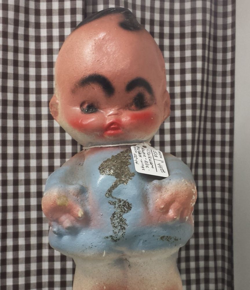 Glass baby(?) with intense eyebrows.