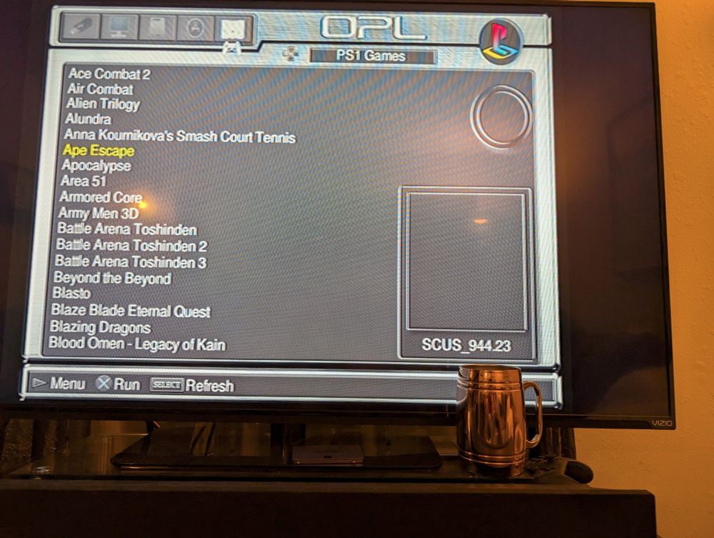 A menu showing lots of Playstation 1 games displayed on a TV screen.