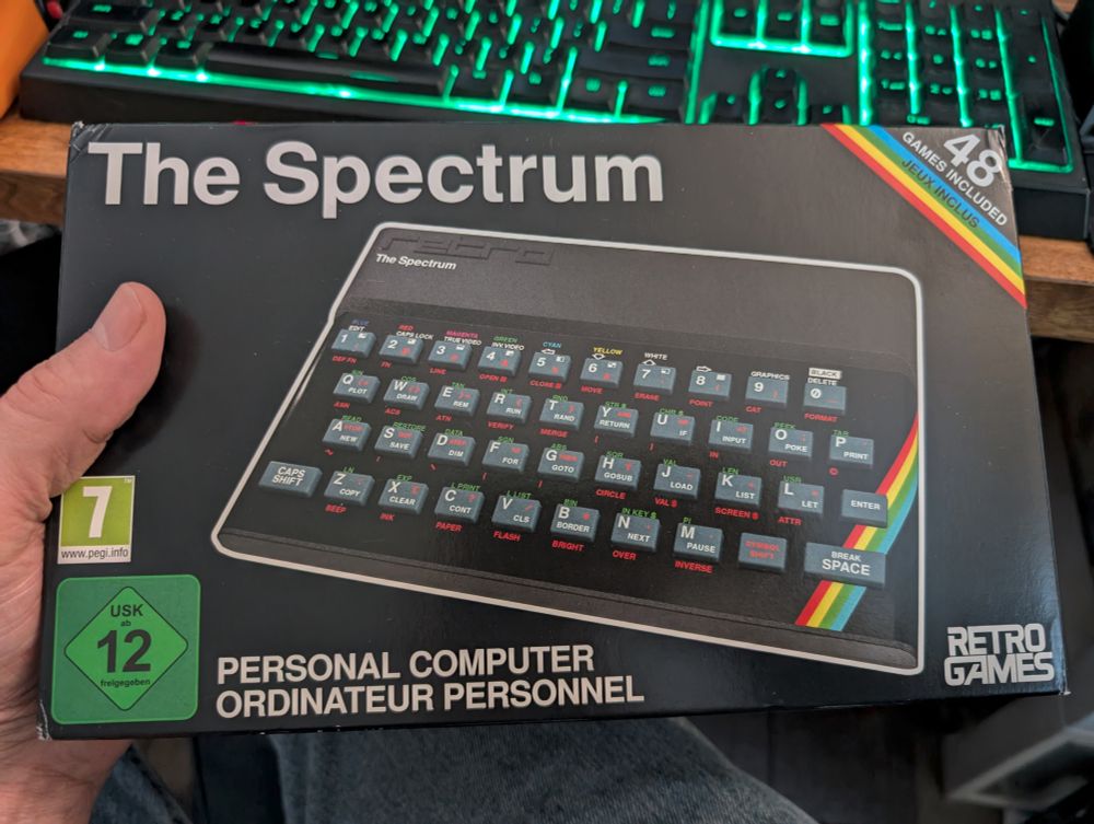 A box containing "The Spectrum" retro console.