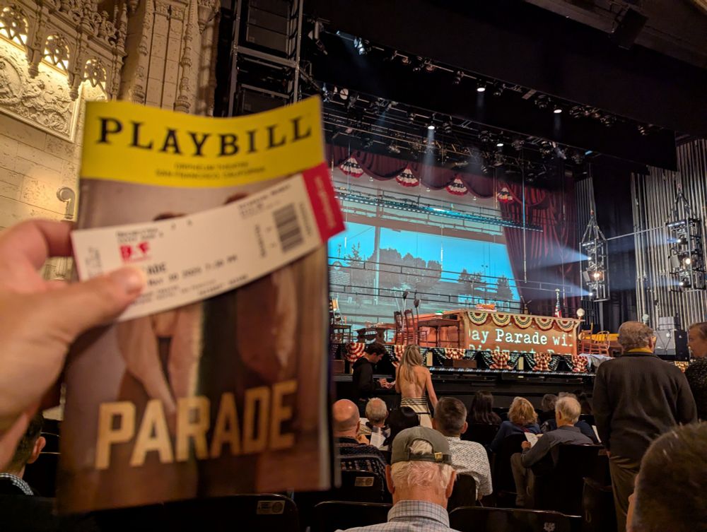 Program, ticket, and stage for Parade