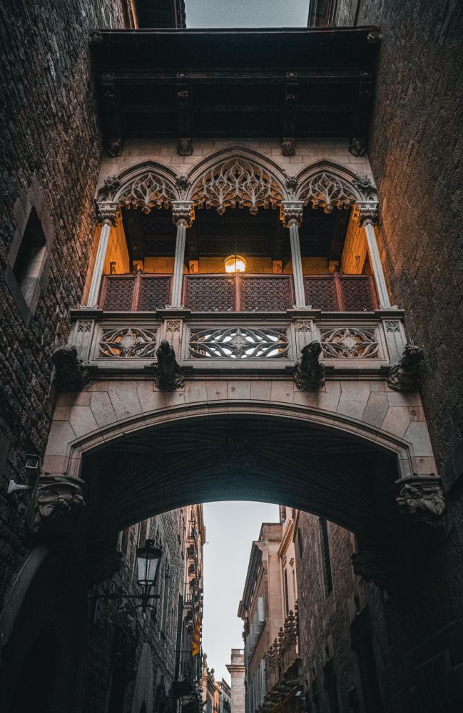 Low angle of Pont del Bisbe in the gothic quarter of Barcelona, Catalonia
