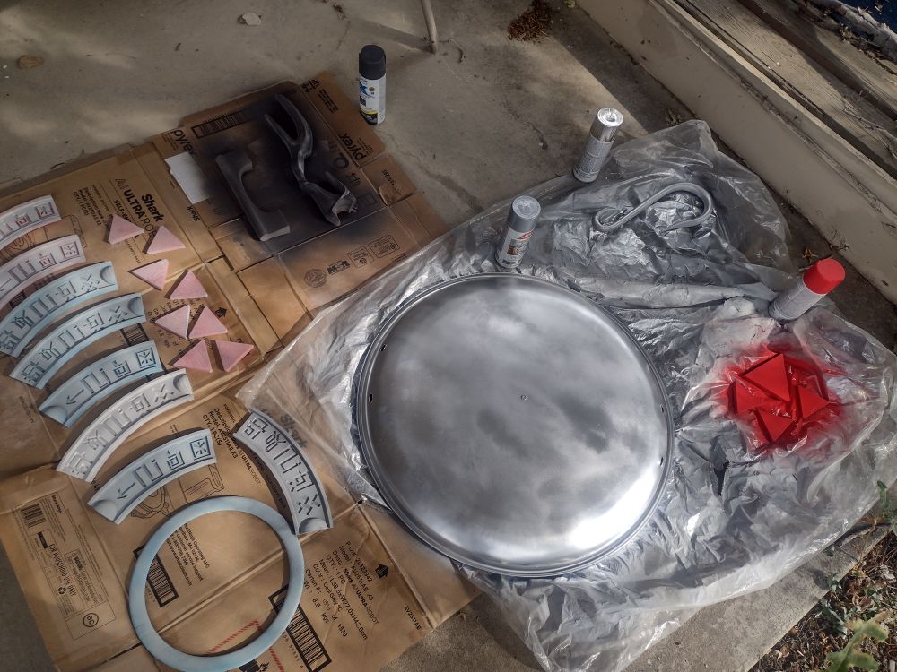 A painting area full of 3d printed details / props and a painted sled