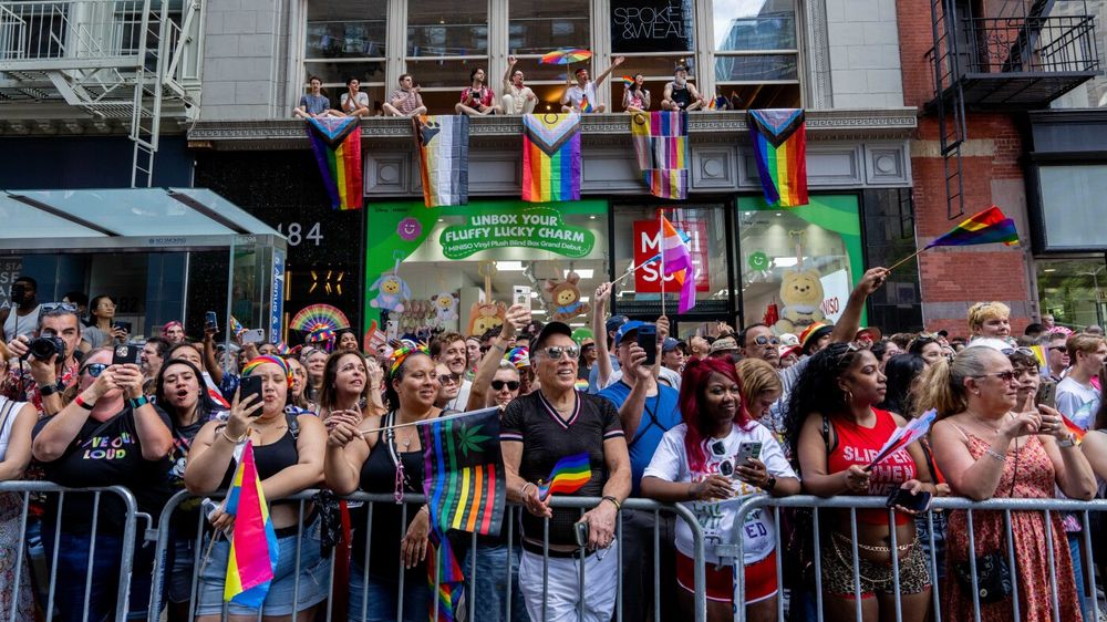 Marchers cap Pride Month with celebration and protest