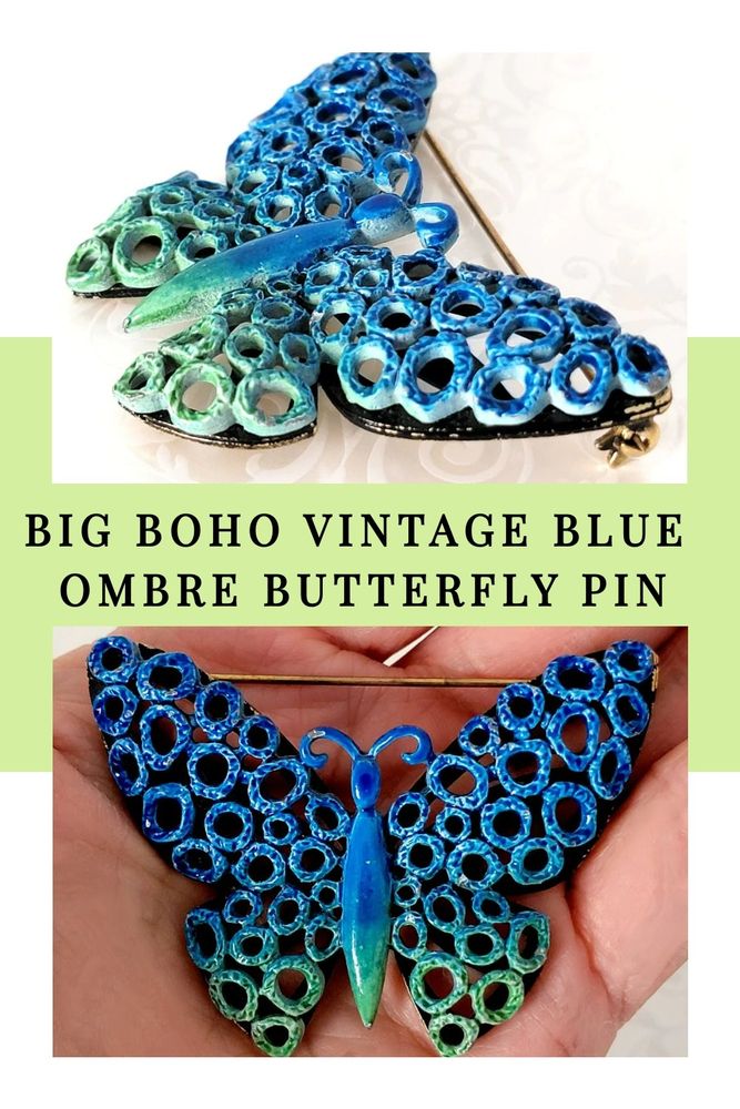 Blue enameled butterfly brooch.