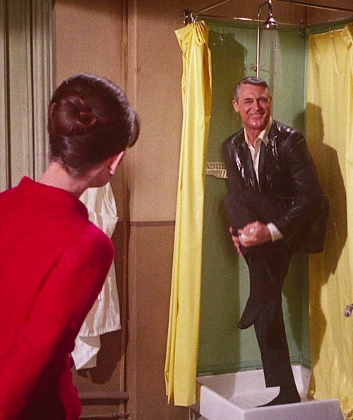Cary Grant having an awkward moment in the shower as he is caught lathering up.