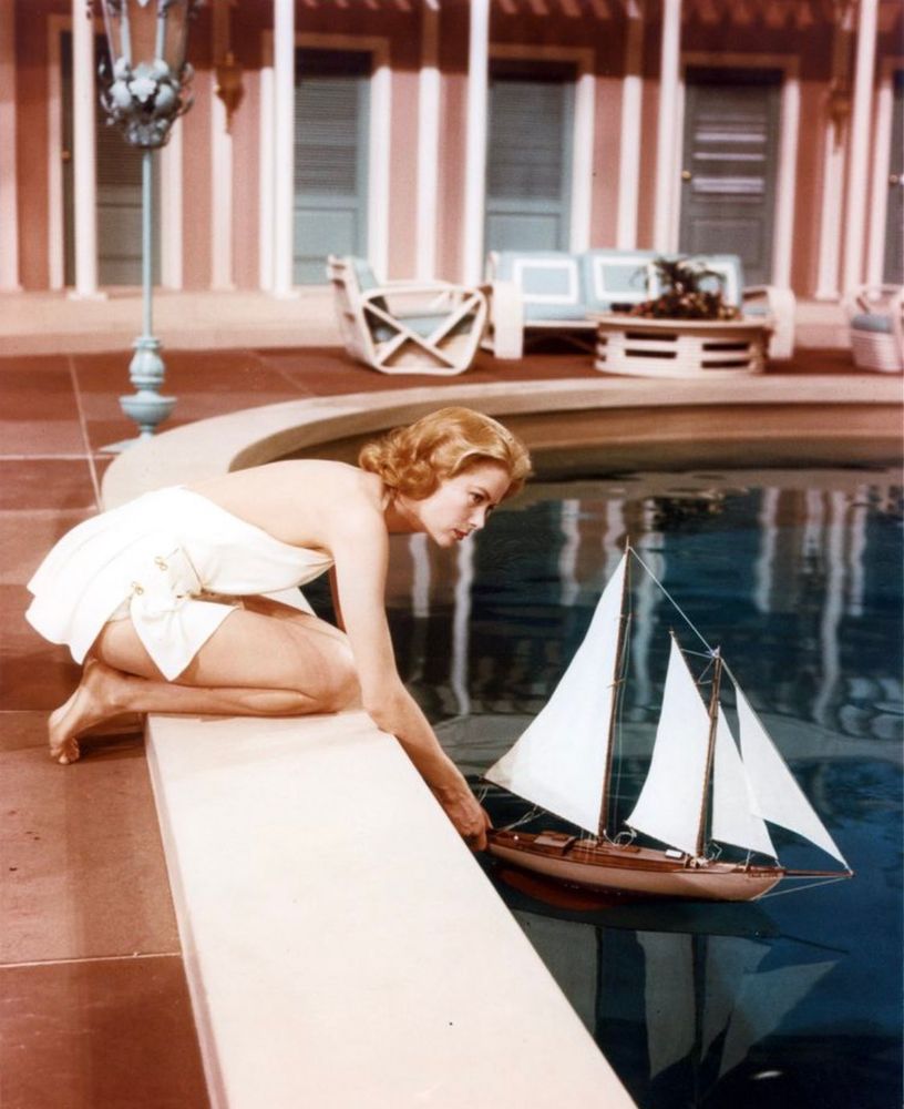 Grace Kelly in High Society launches the model boat True Love.
