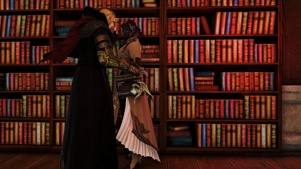 Dark-gray skinned Sea Wolf Roegadyn woman standing beside a row of bookshelves. Zenos stands close in front of her, reaching his arm out to hold her waist. 