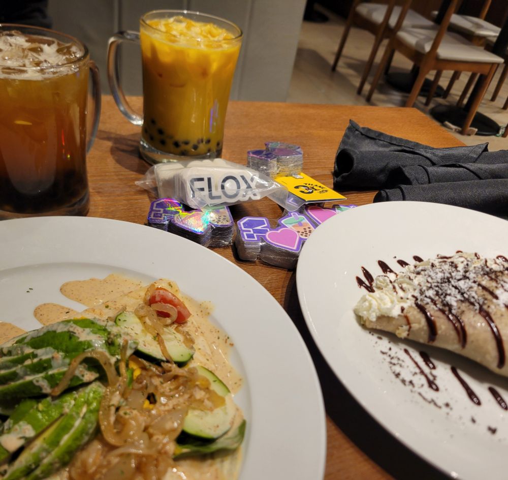 two boba drinks in stein glasses (peach green tea & mango milk tea) with Flox and special Flox glyph<3bobacup stickers, a vegetarian crepe, and an oero crepe