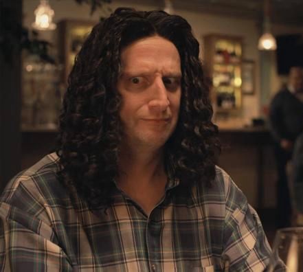 Tim Robinson with hair like a cocker spaniel.