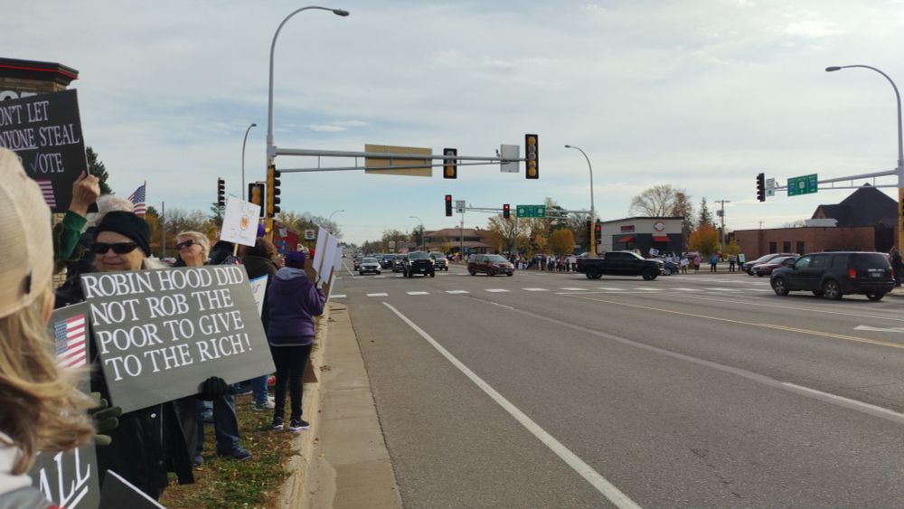 A photo of a protest at an intersection