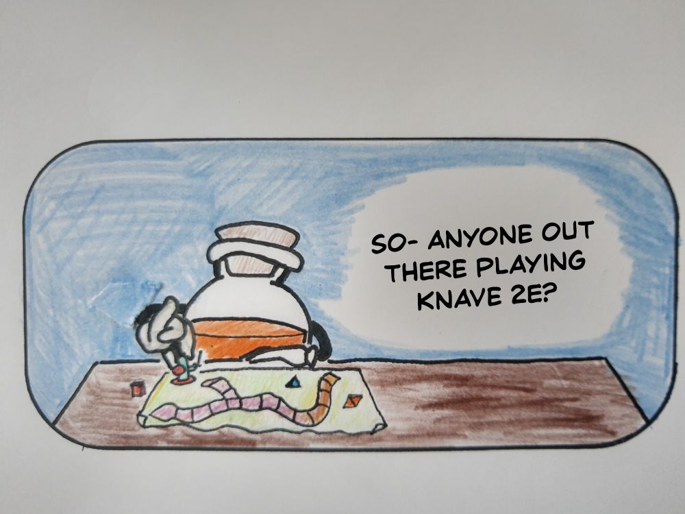 Photo of orange potion hero playing with  a miniature figure on a map. There's dice and a tabletop. He's saying "So- Anyone out there playing Knave 2e?"