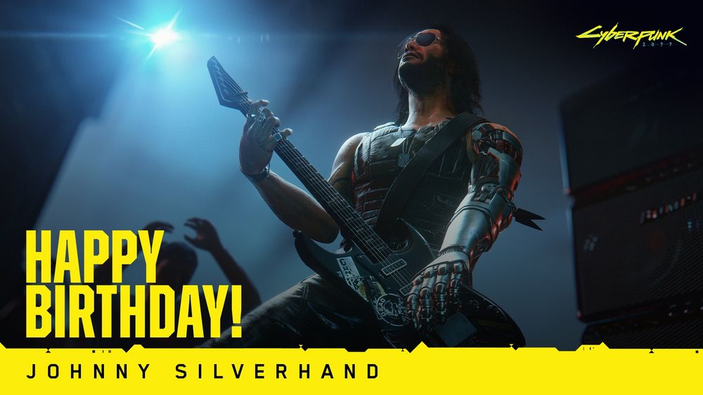 Yellow text reads, "Happy birthday, Johnny Silverhand!" Johnny plays the electric guitar, his cybernetic arm gleaming underneath stage lights. He wears a flak vest with two dog tags hanging from his neck. His black hair flows to his shoulders and he wears a pair of aviators with dark lenses.