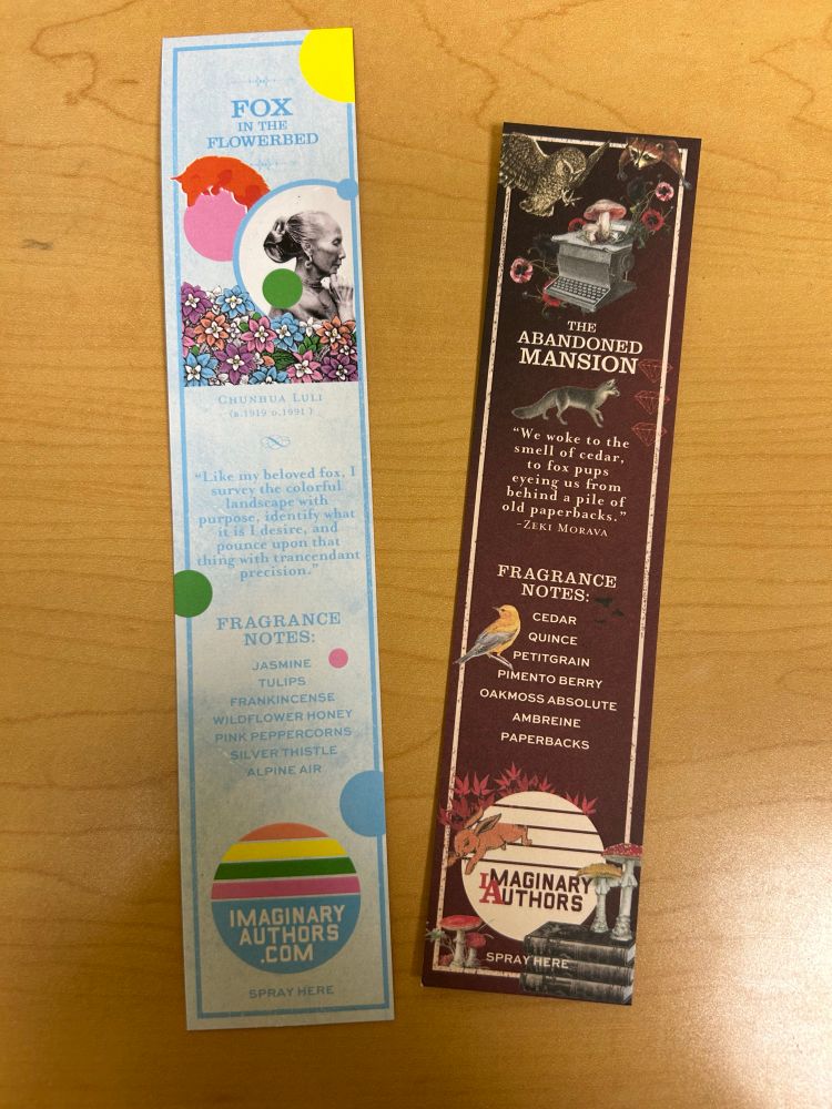 Photo of perfume sampler cards of Fox in the Flowerbed and The Abandoned Mansion from imaginary authors. Fox in the flowerbed has notes of jasmine, tulips, frankincense, wildflower honey, pink peppercorn, silver thistle and alpine air, and abandoned mansion is cedar, quince, petitgrain, pimento berry, oak moss absolute, ambreine, and paperbacks