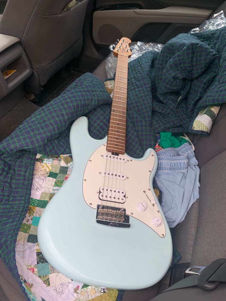Sea-foam blue Sterling Cutlass electric guitar 